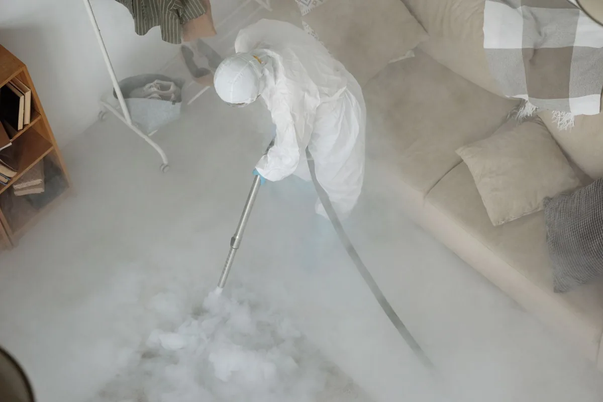 Biohazard cleanup technician in protective equipment, Glen Highlands, Oakland, CA